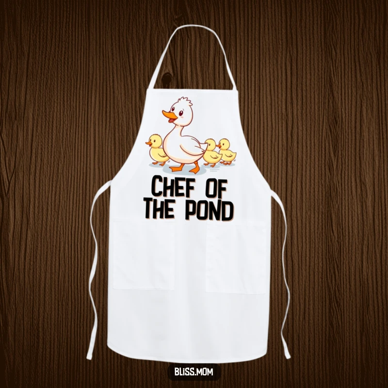 Funny apron: a smiling mama duck waddling with a line of ducklings following, perfect for kitchen fun and mom pride.