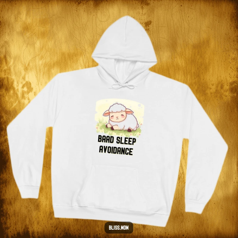 Funny hoodie featuring a content sheep dozing peacefully in a lush green meadow, offering soft, tranquil comfort.