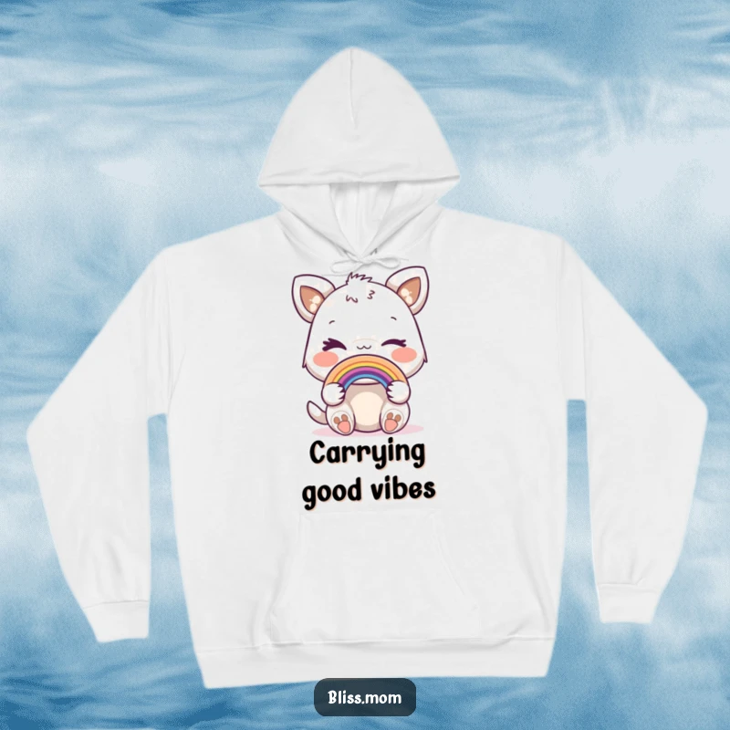 Funny hoodie featuring a joyful animal with a mischievous wink, holding a delicate miniature rainbow.