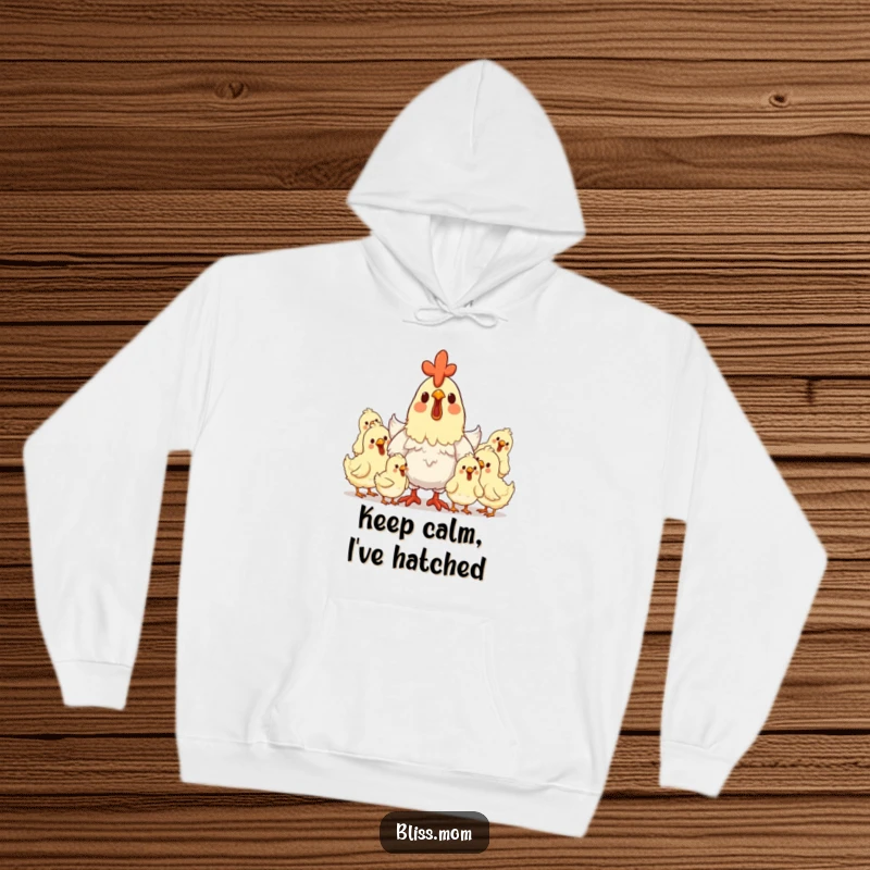 Funny hen mom hoodie depicting a delighted mother hen surrounded by clucking, happy chicks, offering cozy warmth.