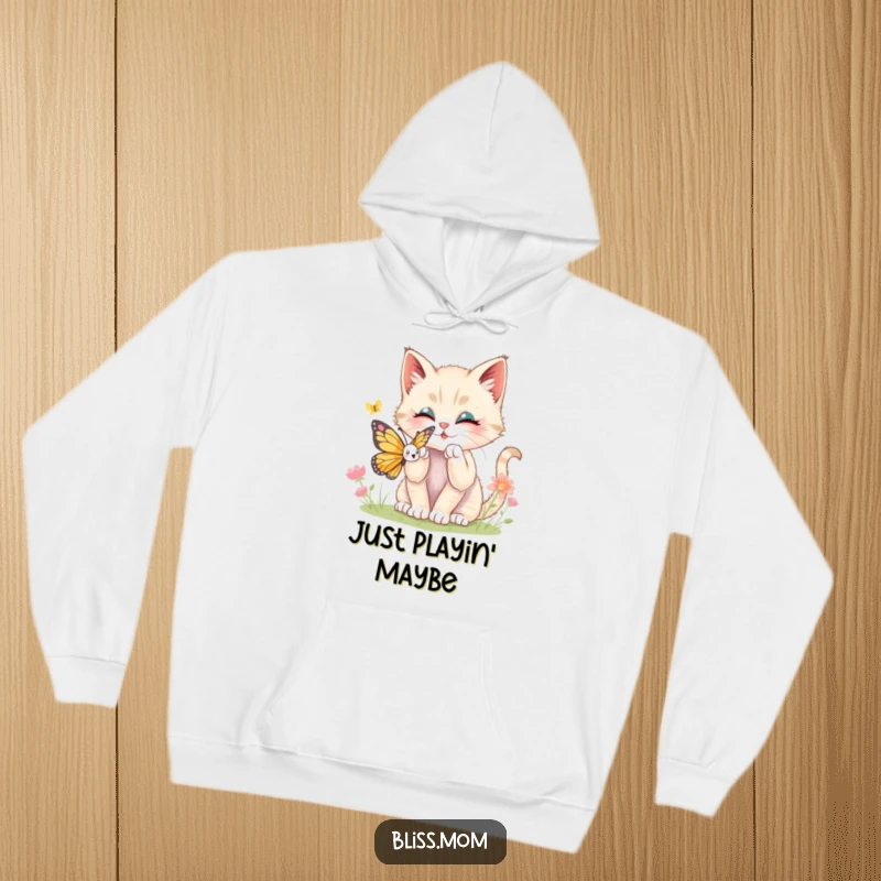 Funny kawaii kitten leaping playfully towards a delicate butterfly, printed on a warm, comfortable hoodie, radiating happiness.