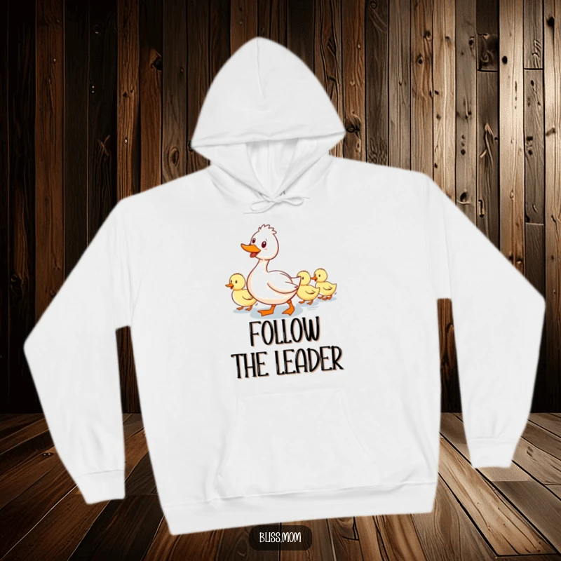 Funny hoodie: a smiling mama duck waddling with a line of ducklings behind her, symbolizing maternal care and togetherness.