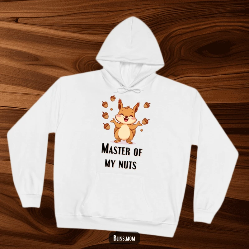 Funny Squirrel Hoodie: Features a giggling squirrel expertly juggling acorns, showcasing its playful nature.