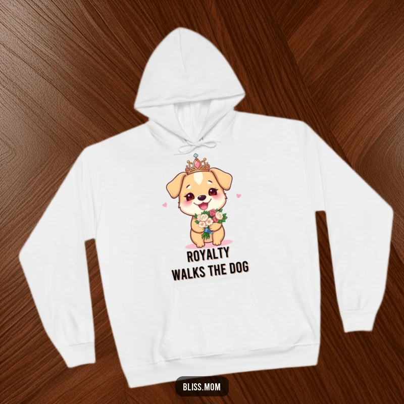 Funny hoodie featuring a joyous dog mom wearing a sparkly tiara and holding a bouquet, looking regal.