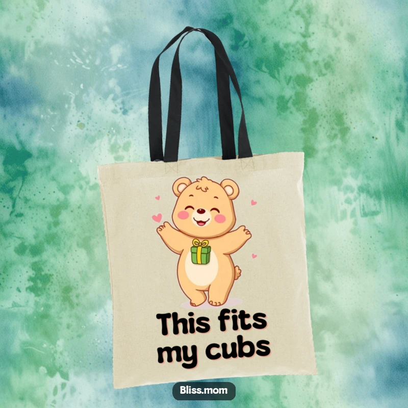 Funny tote bag showing a happy bear mom playfully dancing with a small gift, perfect for bear lovers.